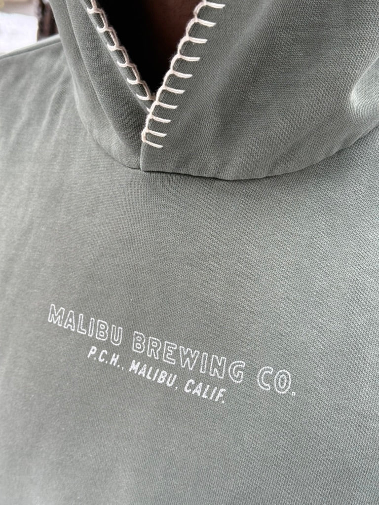 Gray hoodie with Malibu Brewing Co. logo on a plain background