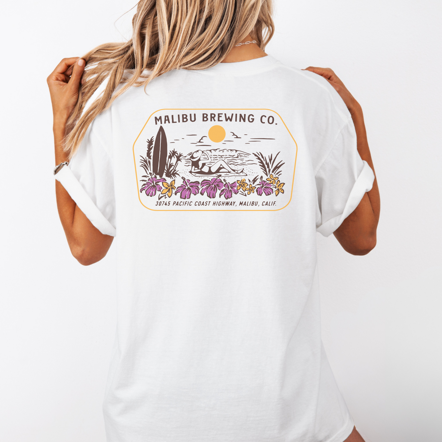 White t-shirt with Malibu Brewing Co. graphic on a plain background