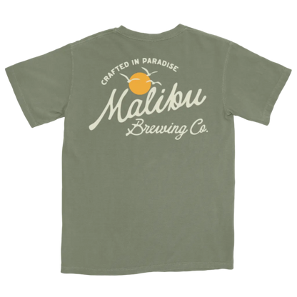 Green t-shirt with Malibu Brewing Co. logo on a white background